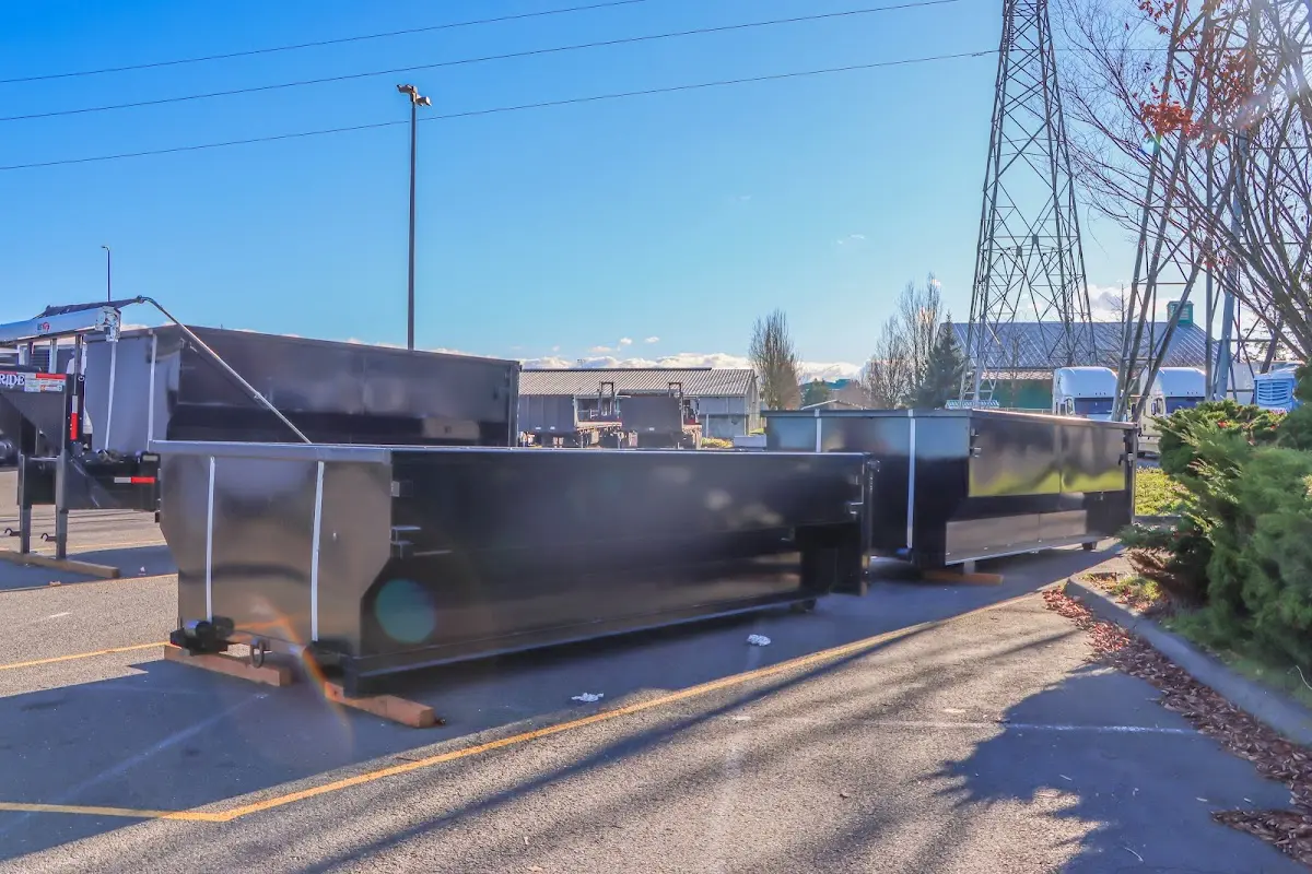 Roll-off dumpster ready for waste disposal at job site for Concrete Dumpster Rental in St. Martin